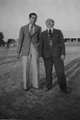 With Sgt. Emms, NCO. in charge of Officers' Mess, Boxing Day 1945