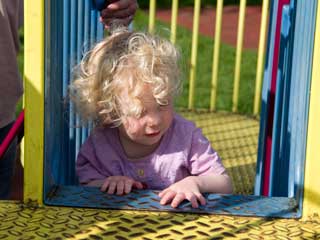 Freya climbs the slide