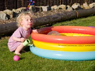 Freya with her paddling pool